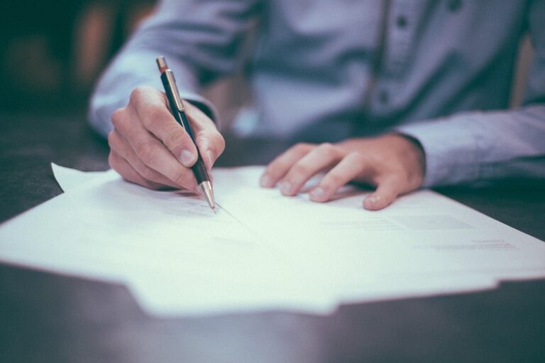 man filling out Car Dealership Customer Satisfaction Survey